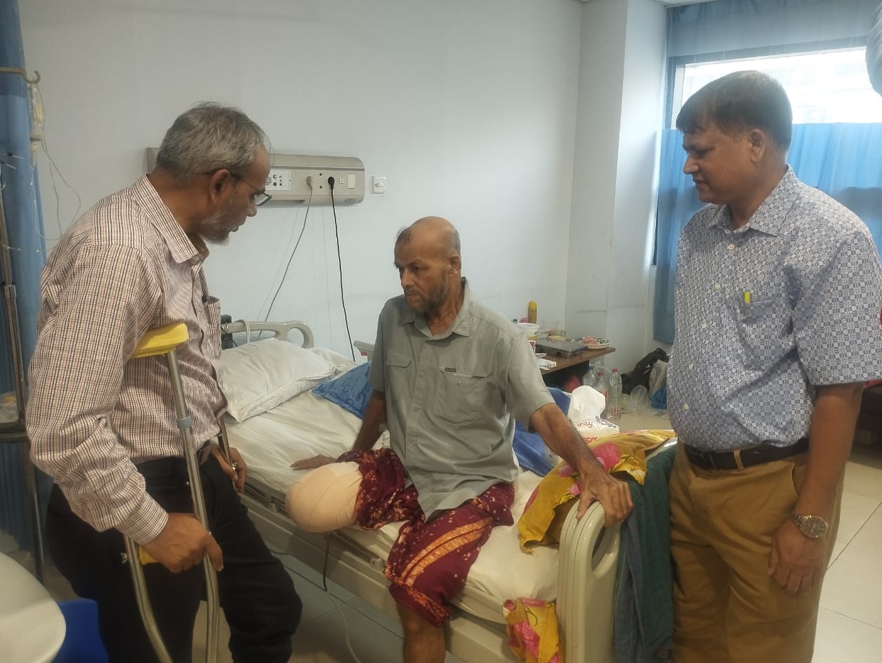 BNP Health Secretary Dr. Rafiqul Islam Visits Hospitalised Labour Affairs  Secretary Nazim Uddin